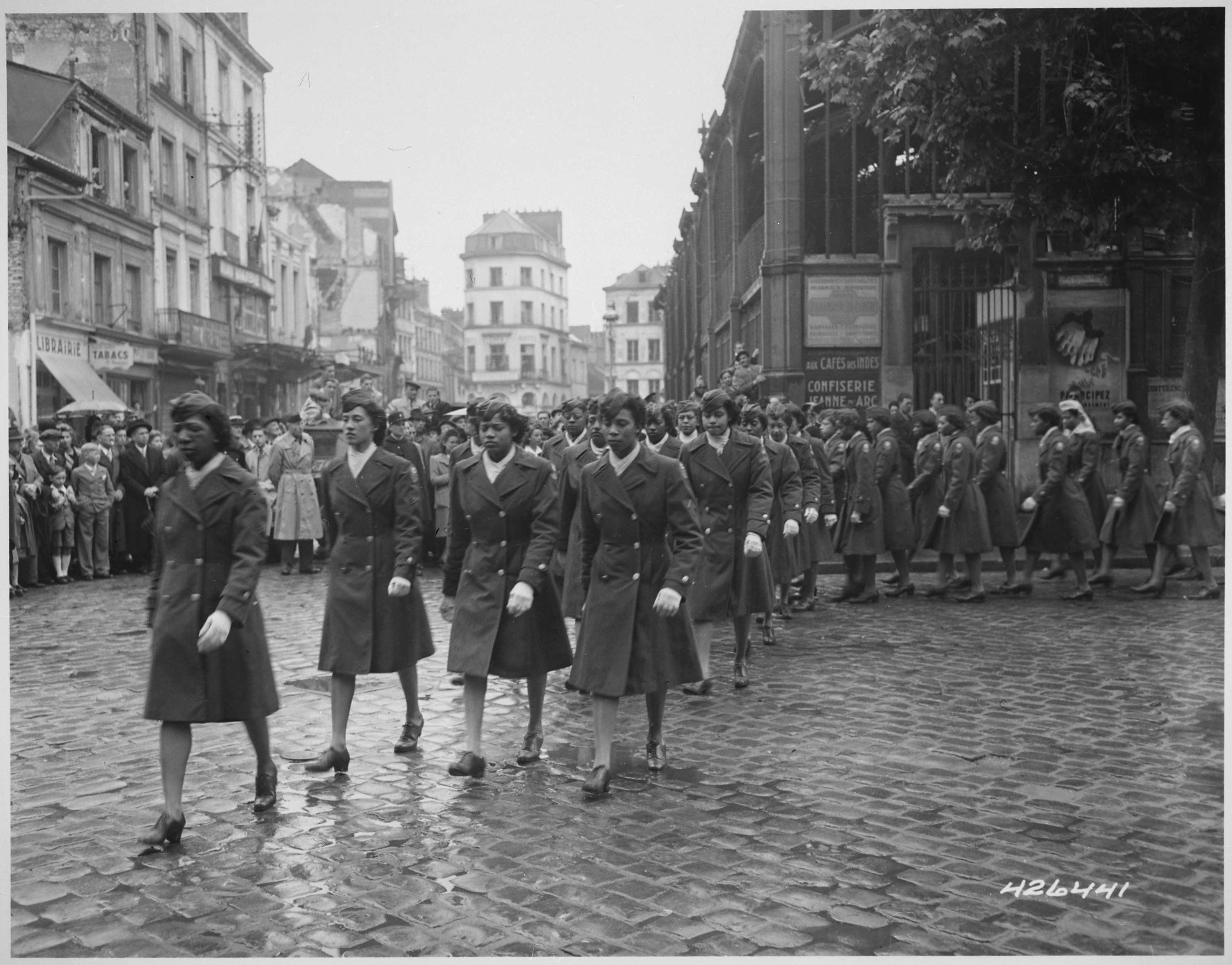 The Six Triple Eight at a ceremony honoring Joan d’Arc at the site of her execution in Rouen, France. May 1945.